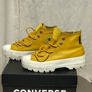 converse yellow leather high lugged sneakers